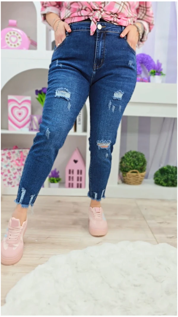 JEANSY Z PRZETARCIAMI FRANCJA